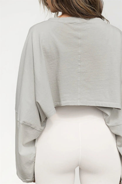 “Flexoora Women’s Loose Long‑Sleeve Crop Training Tee”