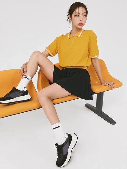 “Flexoora Women’s Quick‑Dry Polo & Pleated Skort Tennis Set”